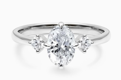 How to Style a Lab-Grown Oval Three-Stone Engagement Ring